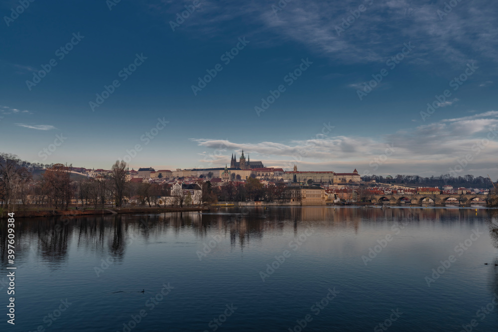 Prague from island on river Vltava near old bridges and towers
