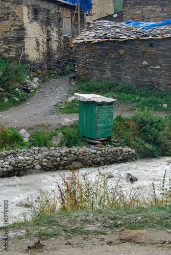 Принти на полотні outhouse on rivers edge