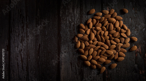 almond on dark wooden table