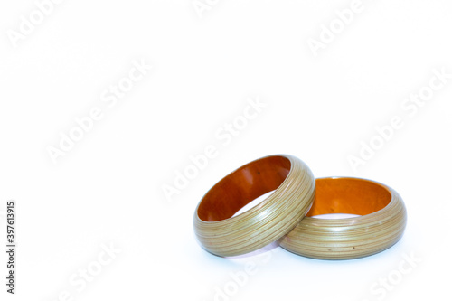 A Selective focus Macro image of a pair of thick bangles captured from various angles with clean white background 