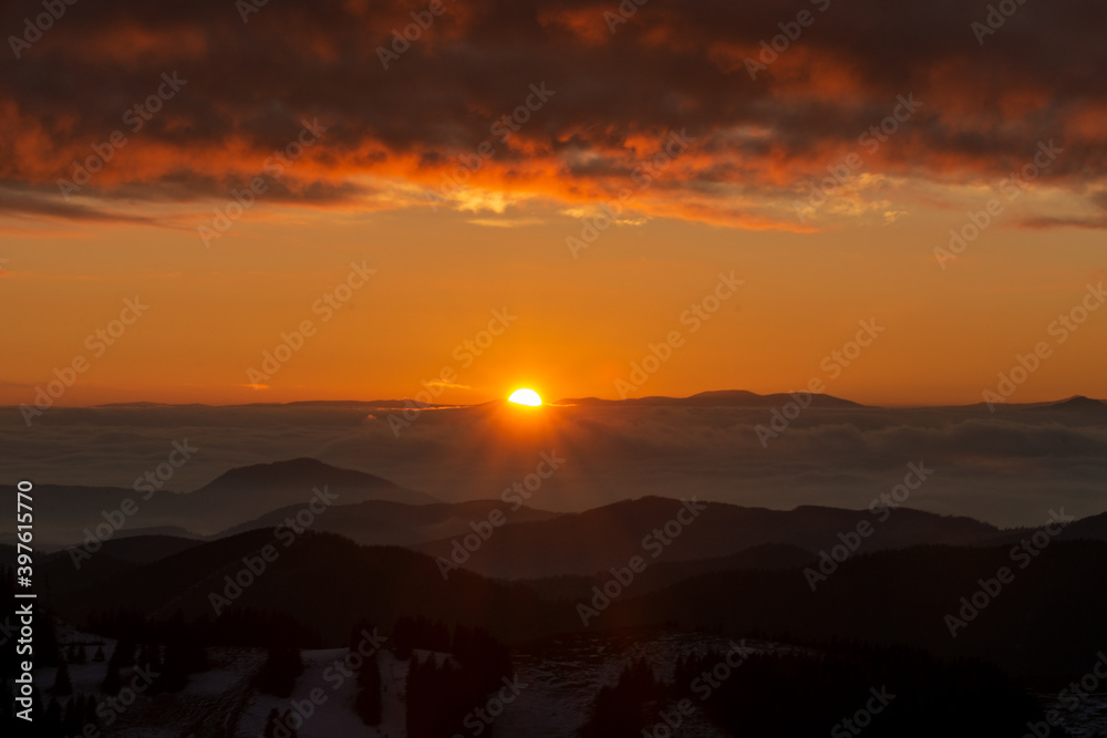 Sunset over the clouds in the mountains, Sommeralm, Austria
