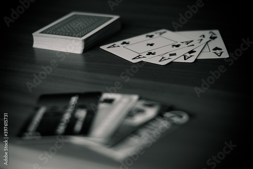 Playing cards are laid out on the table, pictures up and pictures down
