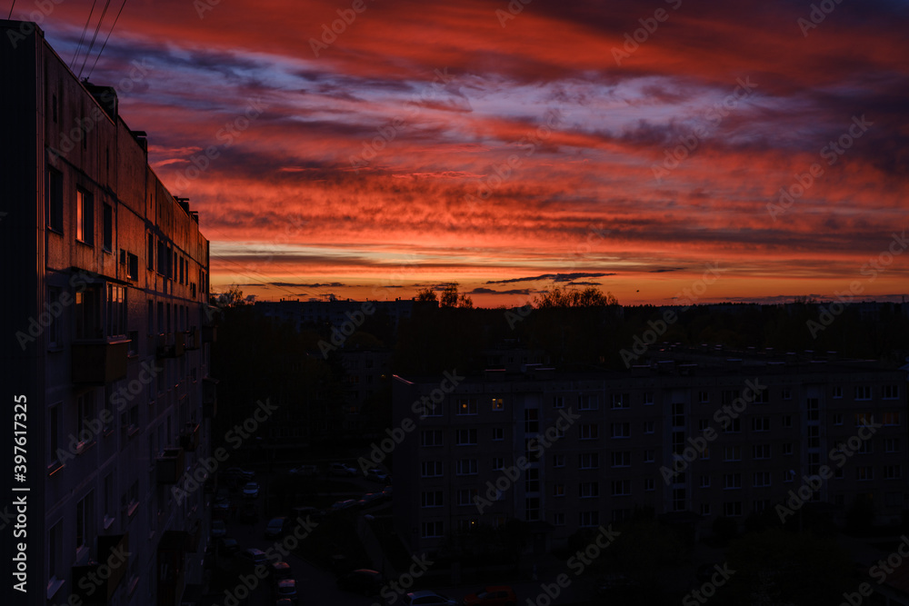 dramatatic red dark sunset over the fields and cities dramatatic red dark sunset over the fields and cities