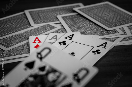 Playing cards are laid out on the table, pictures up and pictures down
