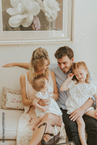 family with children - little girls having a free moment of intimacy
