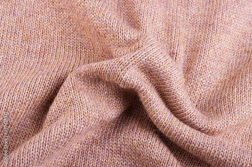 Brown wool knitted fabric with a fine texture