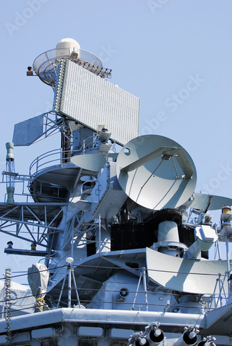 Warship mast and radar antennas.
