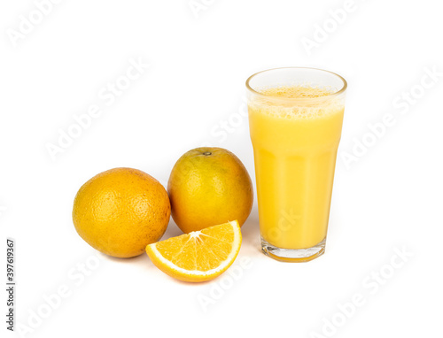 Orange juice with oranges isolated over white background