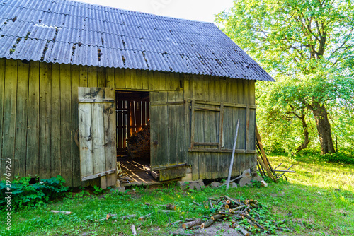 old building interior with wooden planks and brick wall