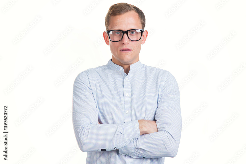Portrait of serious young man in glasses and shirt on white background. Portrait of serious young man in glasses and shirt on white background.