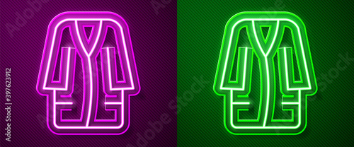 Glowing neon line Bathrobe icon isolated on purple and green background. Vector.
