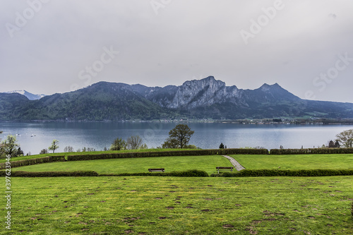 Bild auf Leinwand Picturesque mountain range and lake in the Austrian Alps.