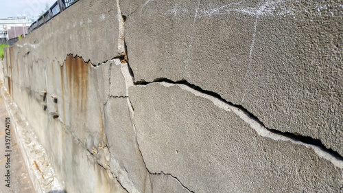 cracks and chips on the ruined foundation of the old building structure
