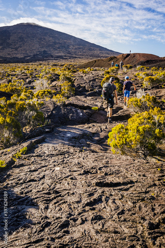 Hikers walking to the summit of the Piton de la Fournaise volcano in Réunion