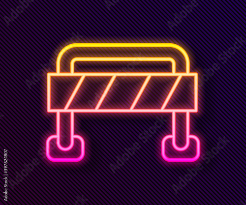 Glowing neon line Road barrier icon isolated on black background. Symbol of restricted area which are in under construction processes. Repair works. Vector.