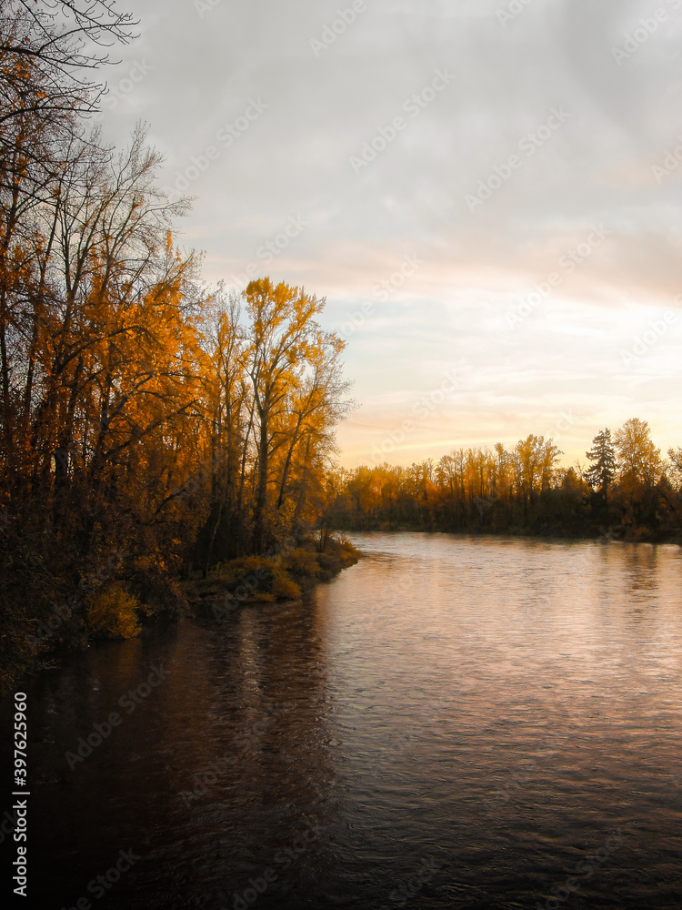 Sunset and autumn foliage along the Willamette River outside Eugene, Oregon