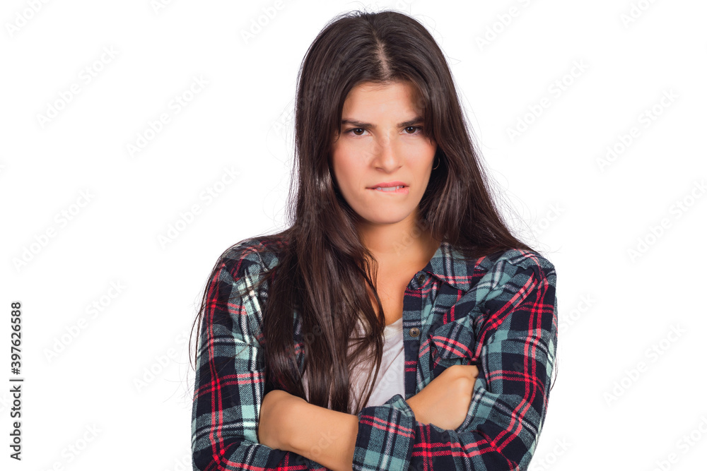 Woman looking at camera with angry expression. Woman looking at camera with angry expression.