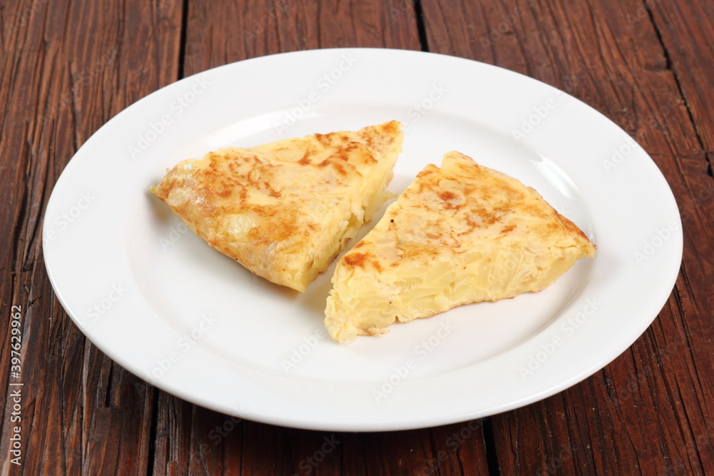 Piece of Spanish omelette on plate