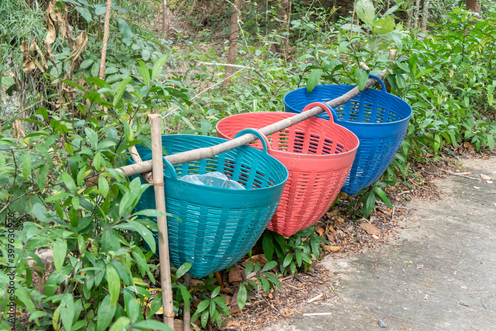 The colorful trash in the park lined up. The colorful trash in the park lined up.