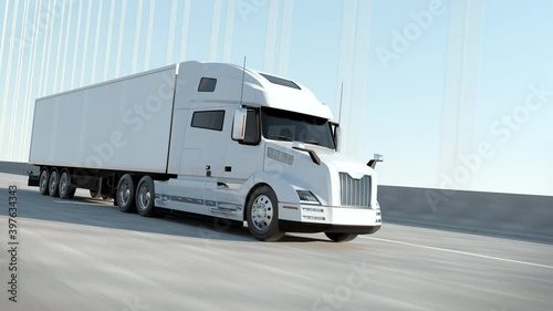 Logistic Transporter Delivering Concept. White Modern Big Semi Truck with Cargo Trailer Full Goods Travels at Day on Freeway Bridge Road. Driving Continental Distribution. Industrial Warehouses Route