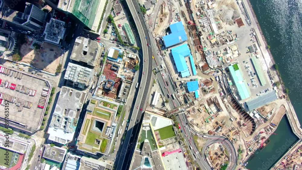 Hong Kong downtown Kowloon urban area, Top down aerial view with traffic and city skyscrapers.