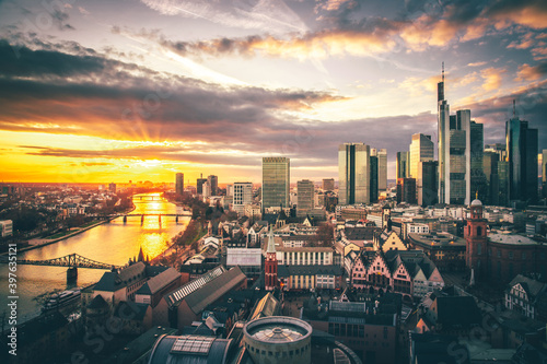 Frankfuert is the only skyline in Germany. backlit photography for sunset with a great sky and lighting in the houses. High-rise buildings, city recording and finance