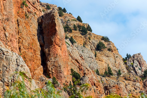 Photo of beautiful fiery red mountains and rocks © Aleksey Dmetsov