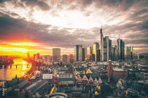 Frankfuert is the only skyline in Germany. backlit photography for sunset with a great sky and lighting in the houses. High-rise buildings, city recording and finance