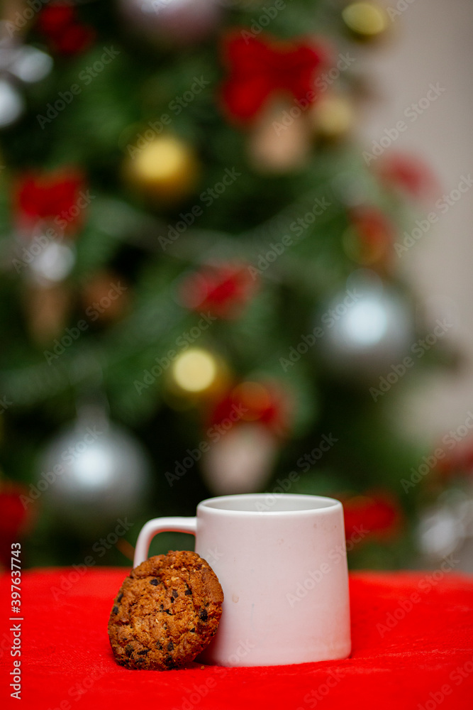 christmas drinks and cakes on background tree christmas drinks and cakes on background tree
