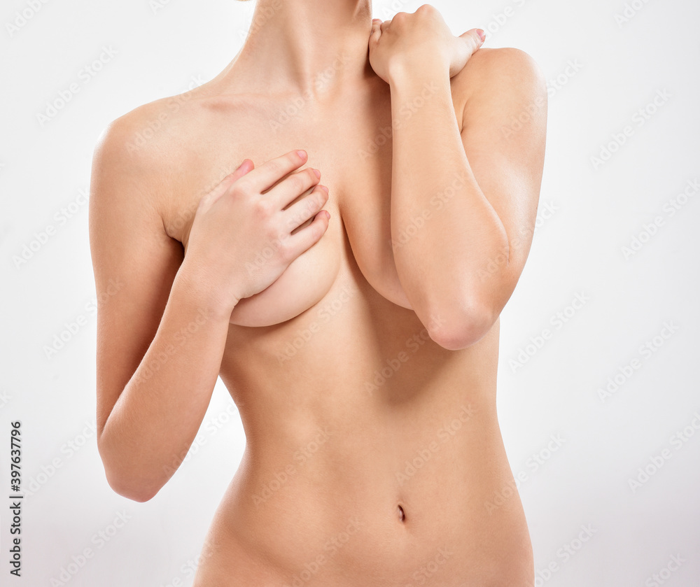 Beautiful young woman with clean skin nude topless breasts. Beautiful woman covering her nude breast. Beautiful young woman with clean skin nude topless breasts. Beautiful woman covering her nude breast.
