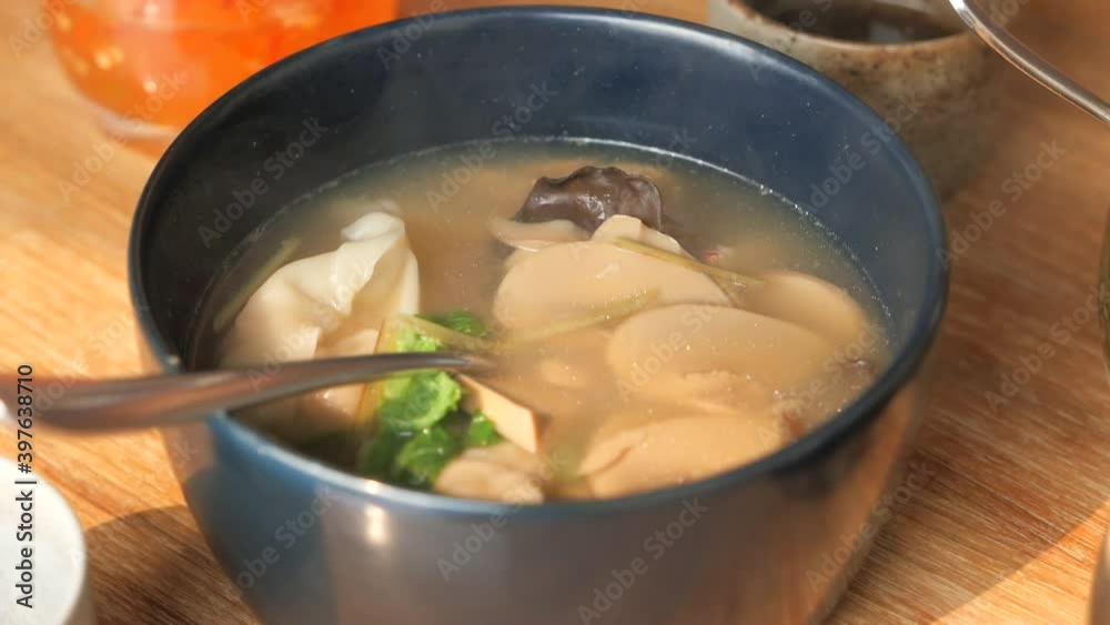close up of vegetable soup in a bowl close up of vegetable soup in a bowl