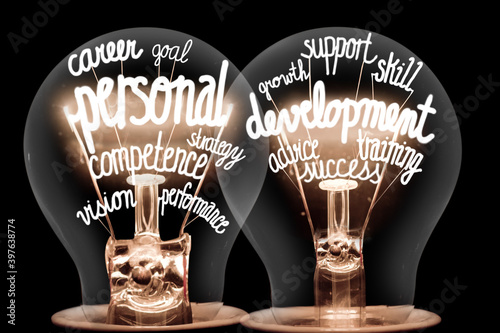 Light Bulbs with Personal Development Concept photo