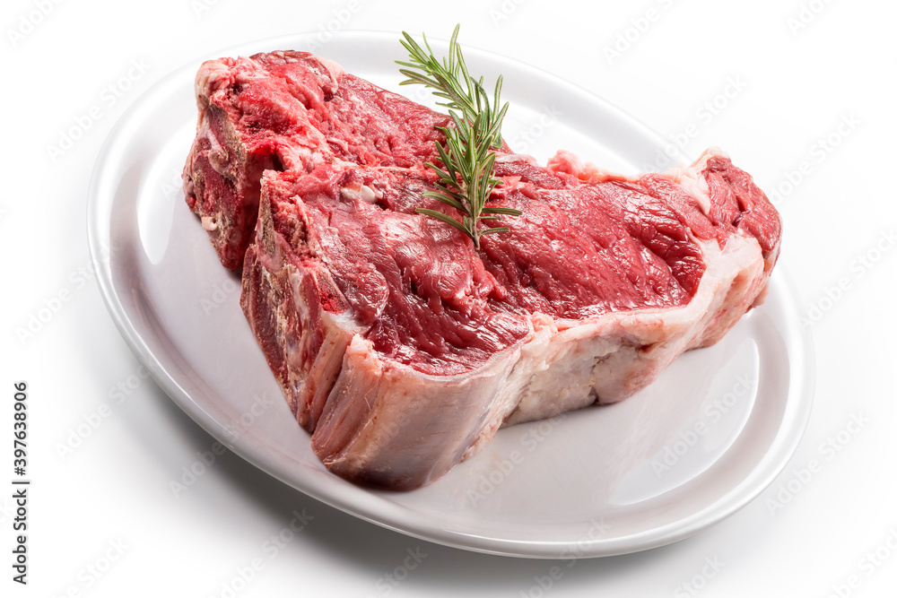 Raw T-bone steak with rosemary