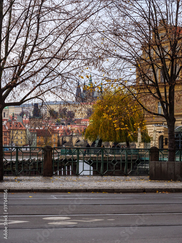 View on Prague Castle and Lesser Town from across the Vltava River on an autumn evening