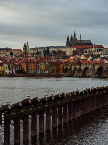 View on Prague Castle and Lesser Town from across the Vltava River on an autumn evening