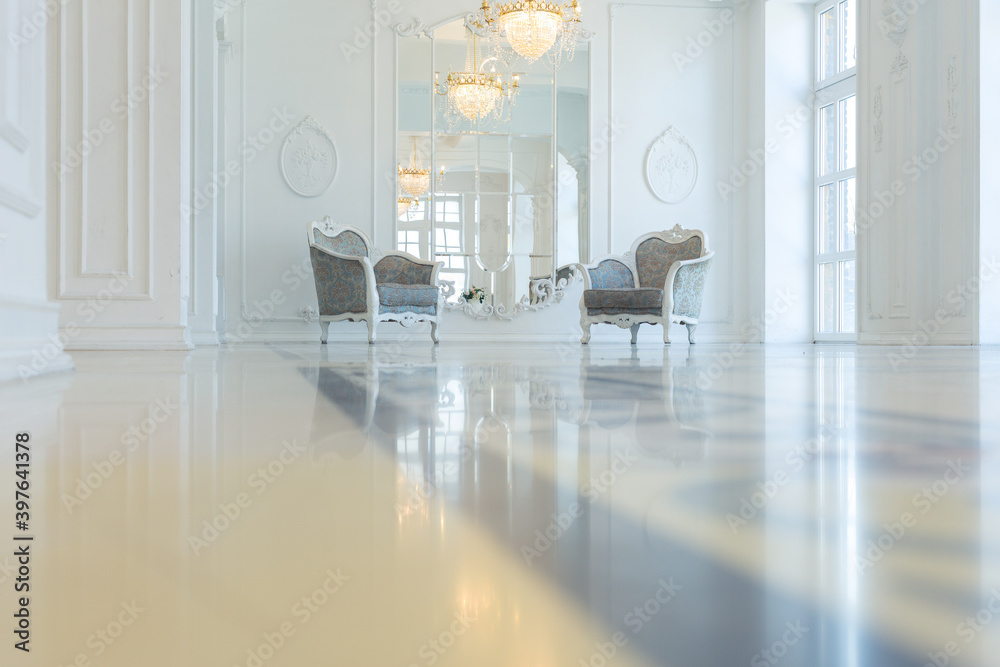 Fototapeta premium beautiful stylish chic rich clean bright blank interior. high white walls with large windows from floor the pattern on the floor