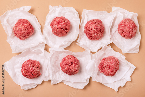 Homemade Raw Meatballs on the Light Brown Background Semifinished Food Top View Horizontal