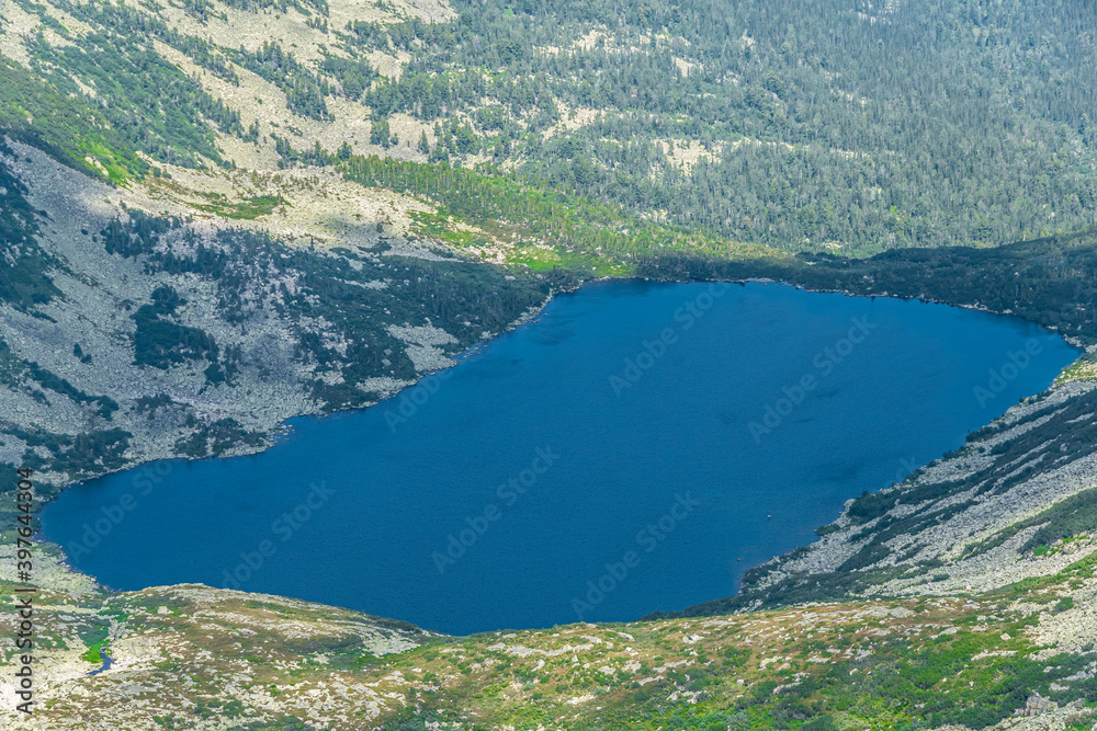 Spectacular view of blue lake in mountain valley