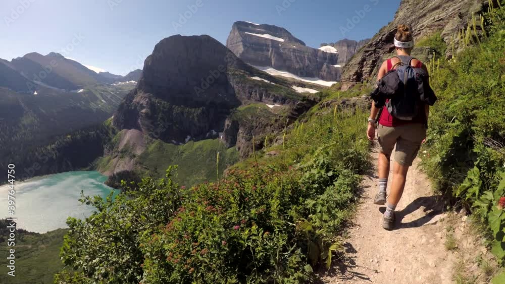 Wanderlust - Young Woman Hiking on Epic Trail in Glacier National Park