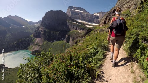 Wanderlust - Young Woman Hiking on Epic Trail in Glacier National Park