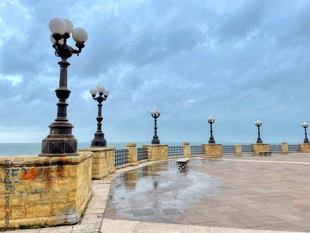View of the seafront round with cloudy sky in Taranto, Puglia, Italy