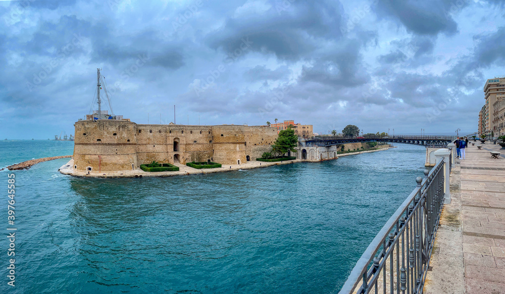 The Aragonese Castle with a view of the navigable canal and the swing bridge of the city of Taranto, Puglia, Italy