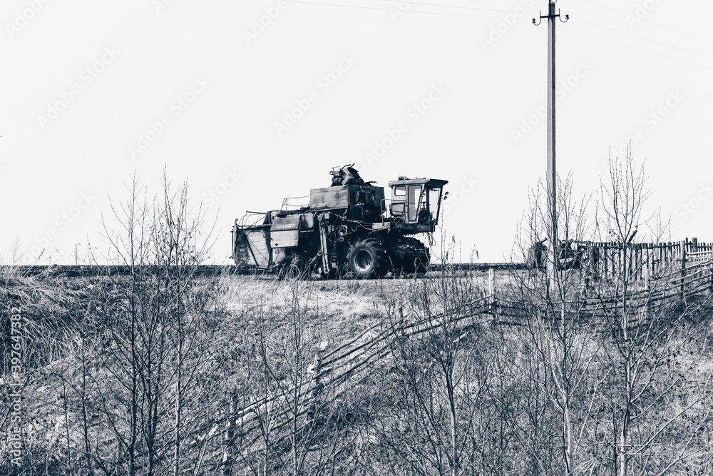 Obraz premium tractor on the field