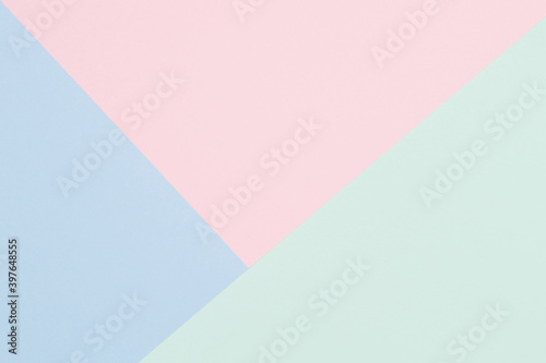 Abstract colored paper texture background. Minimal geometric shapes and lines in light blue, pastel pink, green colors