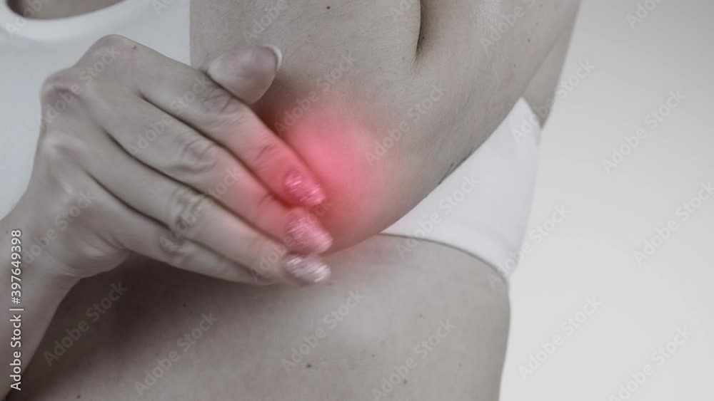 Woman with pain in the elbow Woman with pain in the elbow