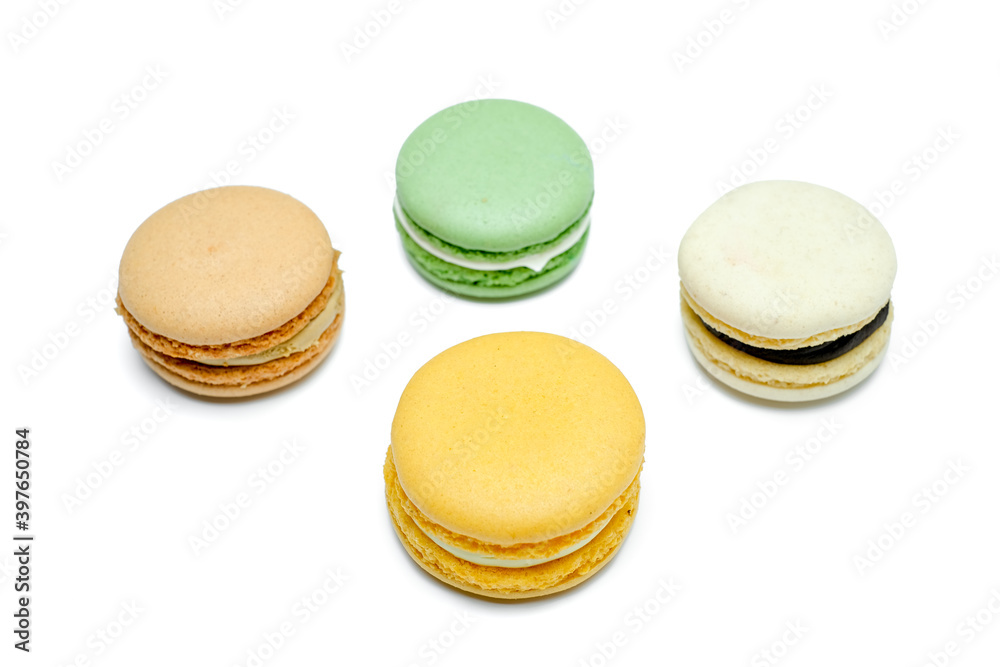 Sweet and colourful french macaroons or macaron on white background Sweet and colourful french macaroons or macaron on white background