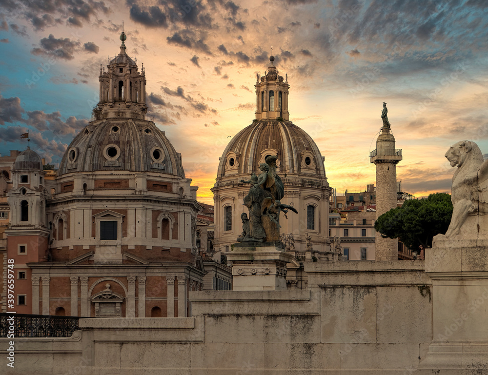 golden hour in Rome Italy, view of Santa Maria di Loreto and palazzo Valentini domes from Venice square...