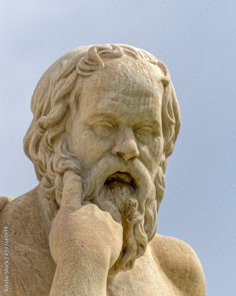 Socrates the ancient Greek philosopher under dramatic sky, Athens Greece