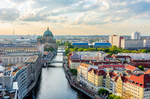 Berlin Cathedral (Berliner Dom) on Museum island and Spree river at sunset, Germany photo