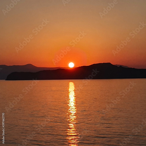 Colorful sunset over the water on Crete  Greece.